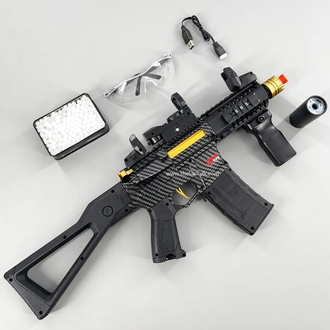 Carbon Fiber Gold Embellished ARP556 Gel Blaster