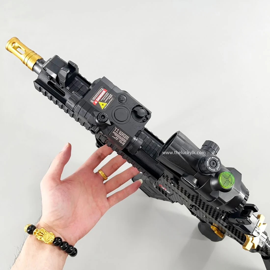 Carbon Fiber Gold Embellished M416 Gel Blaster